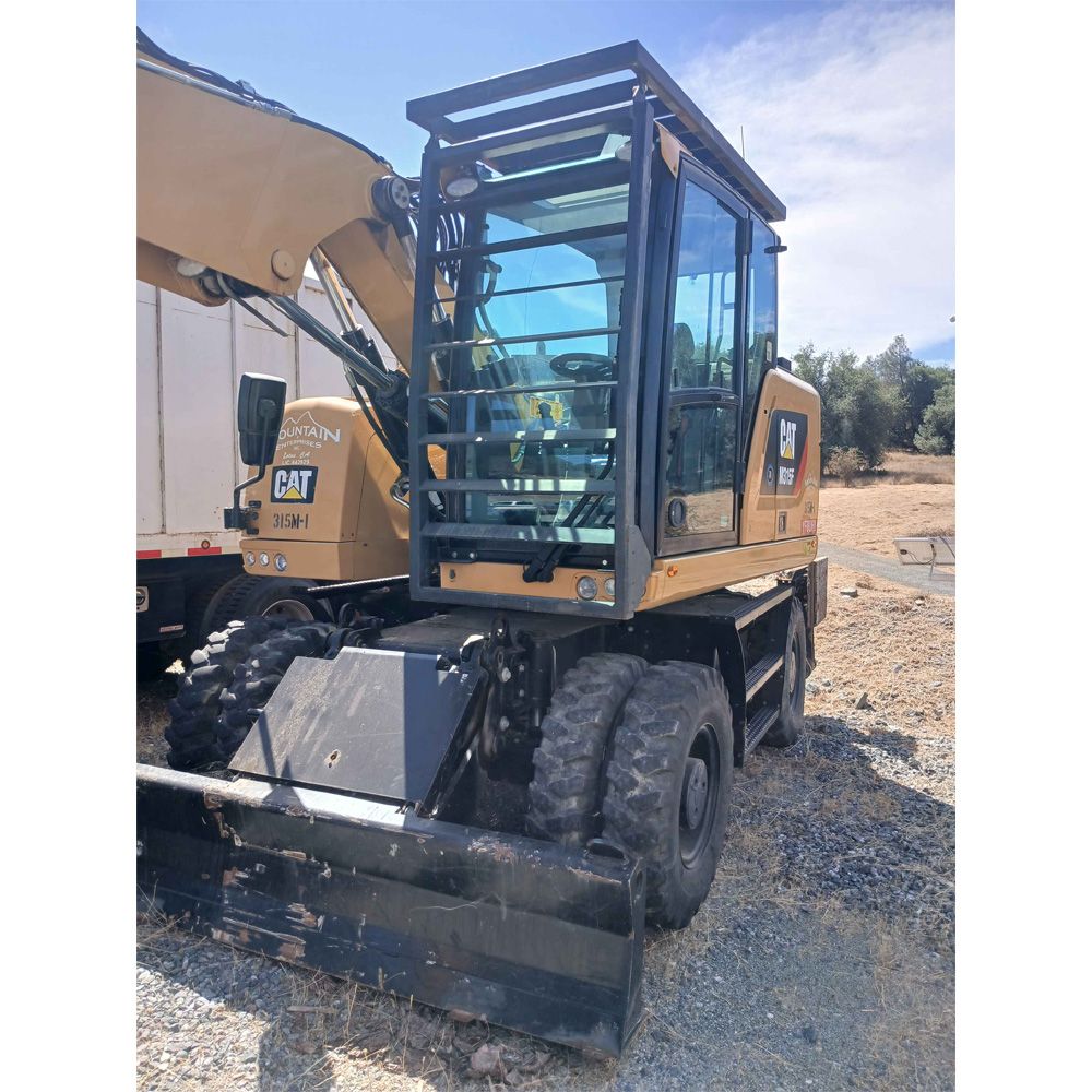 Caterpillar M315 Wheeled Excavator 2019 with a Woodcracker C350 Tree Shear