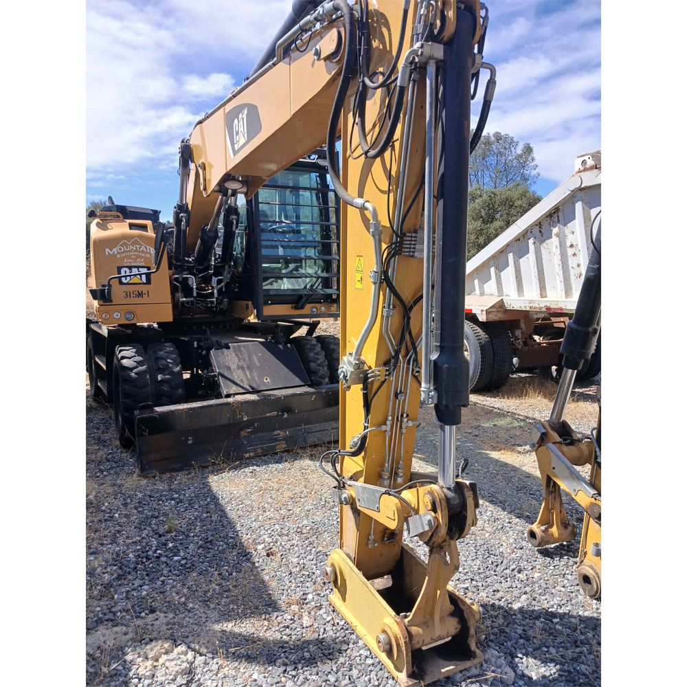 Caterpillar M315 Wheeled Excavator 2019 with a Woodcracker C350 Tree Shear